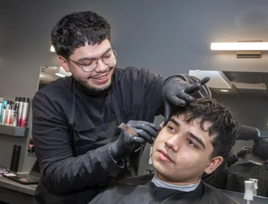 Portrait of barber Rayan Cole